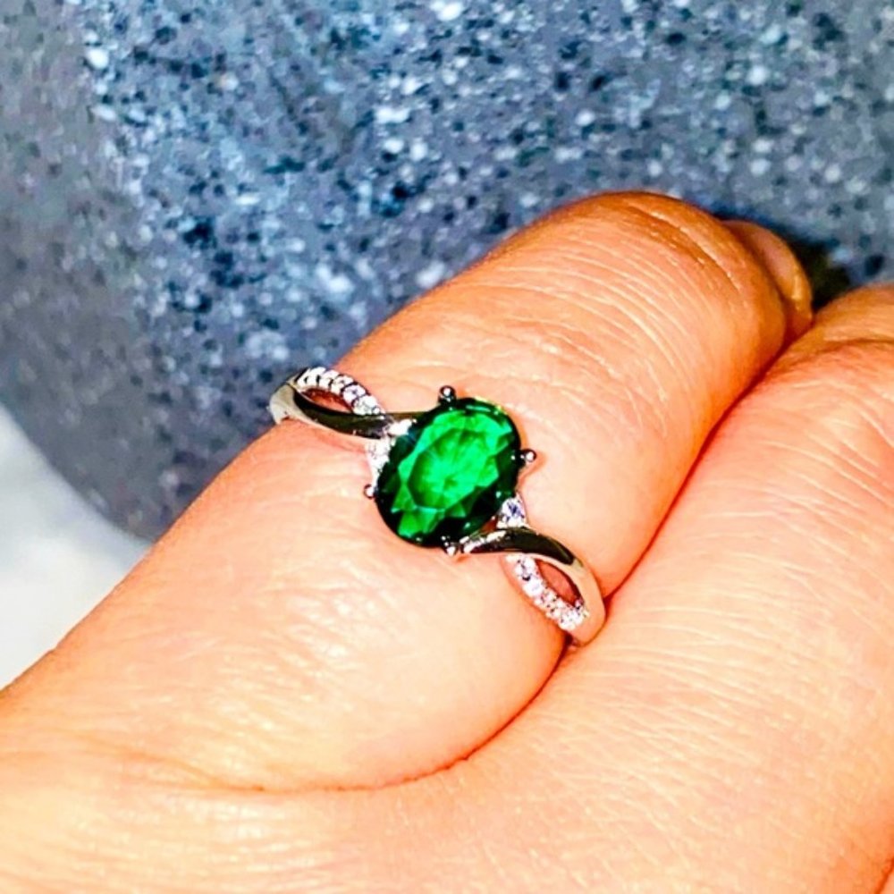 Sterling Silver ?? Ring Adjustable size with a Shining Green Zirconium stone